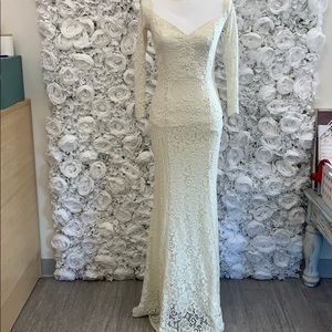 Long sleeved white lace dress